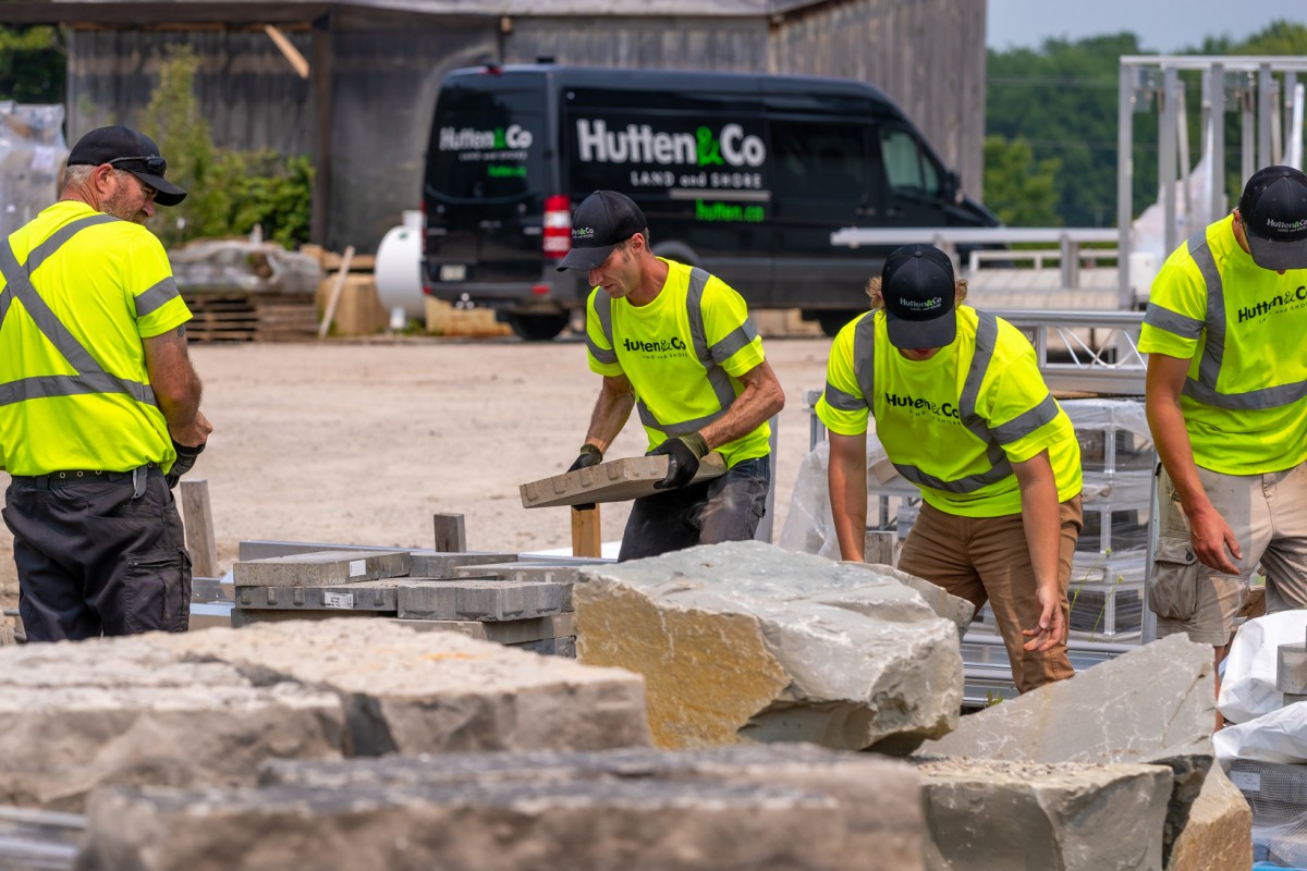 Employees working together on a job site.