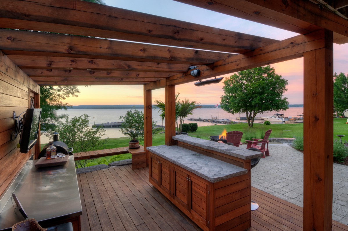 View of an outdoor kitchen at sunset.